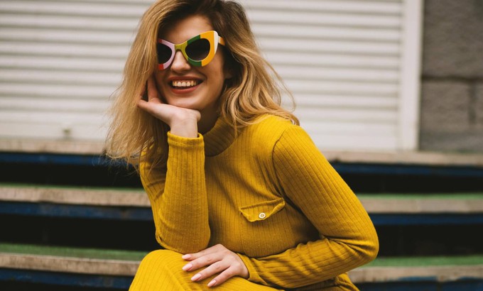 Consumer dressed in yellow after finding their personal clothing style