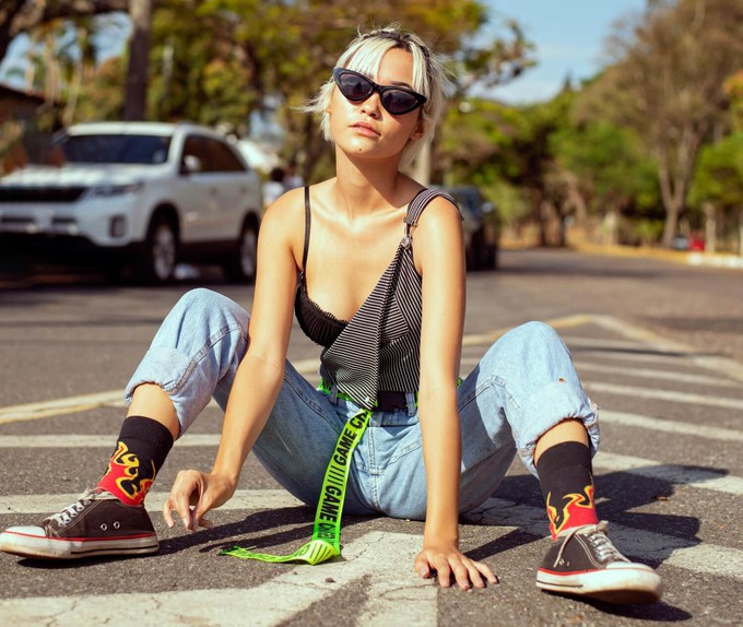 Consumer rocking a sustainable streetwear outfit