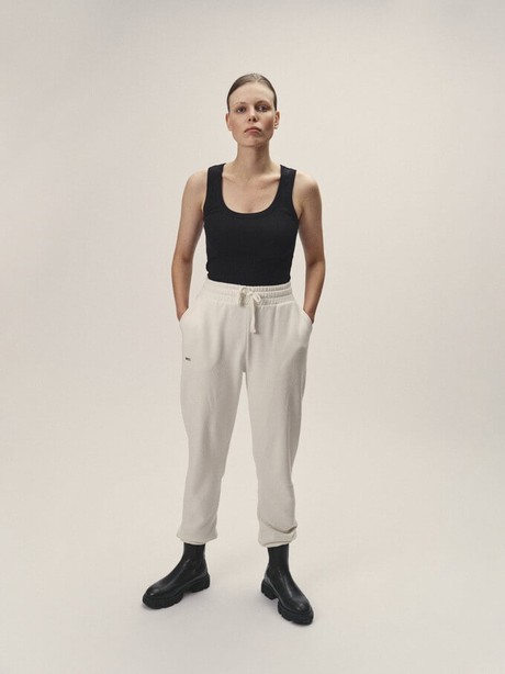 Consumer wearing sustainable streetwear sweatpants