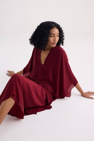 Front Twist Kaftan Dress in Burgundy from Reistor