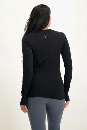 Karuna OM Longsleeve Yoga Shirt – Onyx Black from Urban Goddess